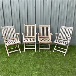Set four teak slatted folding garden armchairs - THIS LOT IS TO BE COLLECTED BY APPOINTMENT FROM DUGGLEBY STORAGE, GREAT HILL, EASTFIELD, SCARBOROUGH, YO11 3TX