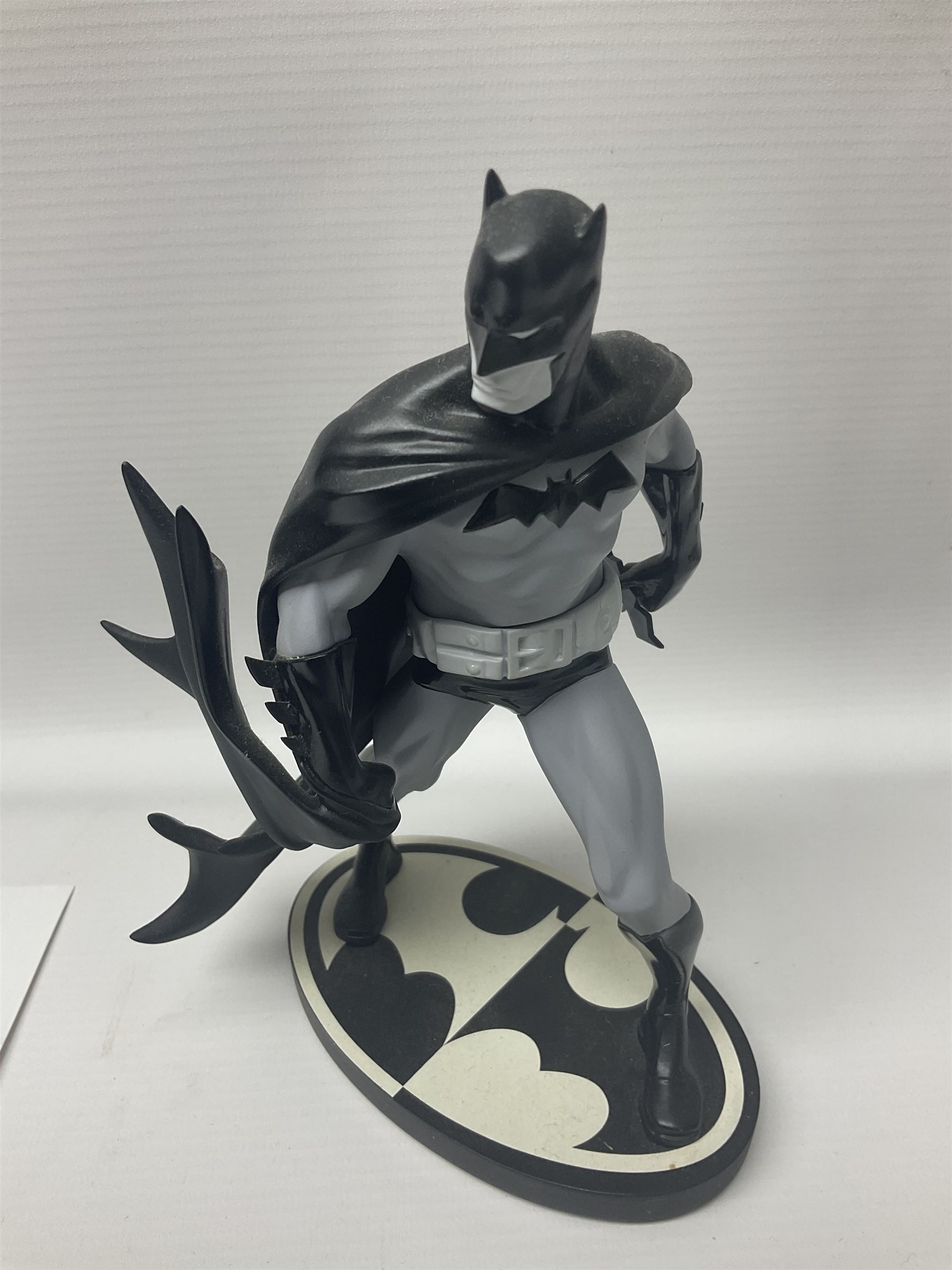 Group of five limited edition DC Direct Black and White Batman hand-painted cold-cast porcelain statues in original boxes, with two similar examples from DC Collectibles 