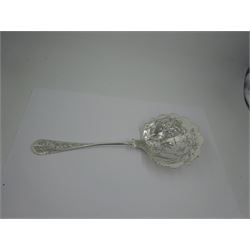 French silver aesthetic movement serving spoon, the scallop edged bowl engraved with a bird amongst flowers and foliage, stamped with Minerva's head standard and weevil export mark, L23cm