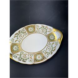 Royal Crown Derby part dinner service, decorated in the Green Derby Panel pattern, comprising thirteen dinner plates, nine dessert plates, two covered tureens, and sauce boat and stand, (seconds)