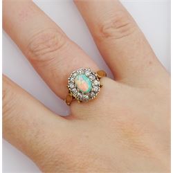 9ct gold opal and cubic zirconia cluster ring, hallmarked