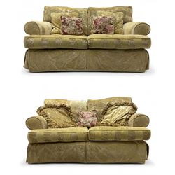 Pair of hardwood-framed two-seat sofas, upholstered in pale gold foliate pattern fabric, r...