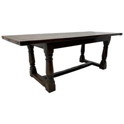 20th century Jacobean design oak refectory dining table, rectangular plank top with cleated ends, on turned supports united by H-stretchers 