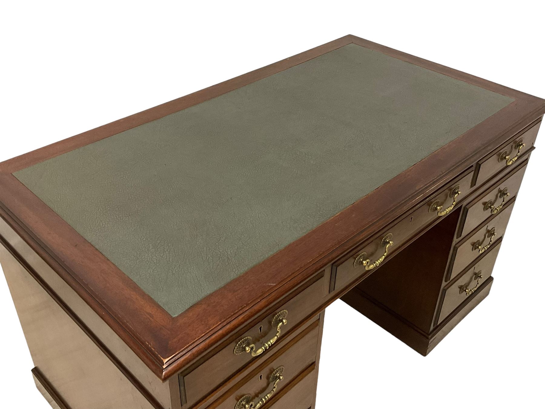 Late 19th century mahogany twin pedestal desk, moulded rectangular top with inset leather, fitted with nine drawers, on plinth base