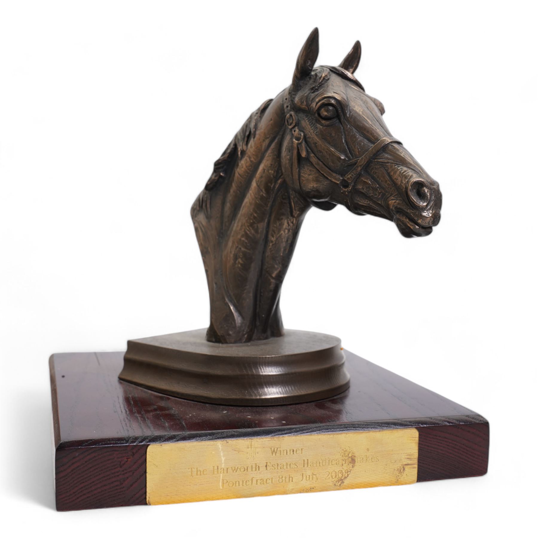 'Winner The Harworth Estates Handicap Stakes, Pontefract 8th July 2008' - Bronzed resin horses head by Doris Lindsey on wooden base 21cm x 20cm , another 'Tote Scoop6 6th November 1999, signed with initials 'CD' and two others (4) 