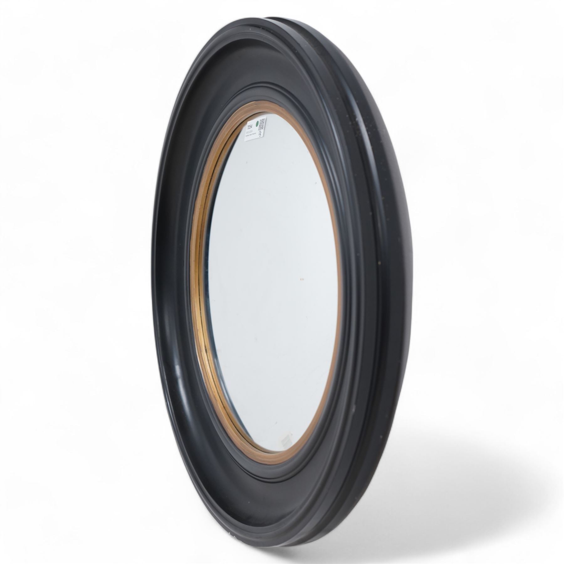 Regency design circular convex wall mirror, in moulded ebonised frame with gilt inner slip 