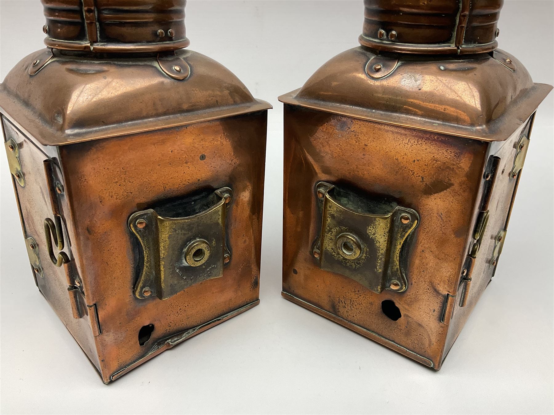 Pair of ‘Starboard’ and ‘Port’ copper ship lamps, of bow-fronted triangular form, H21cm