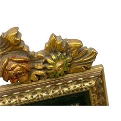 Spanish style wood and composite wall mirror, flower head pediment over plain mirror plate, foliate moulded frame