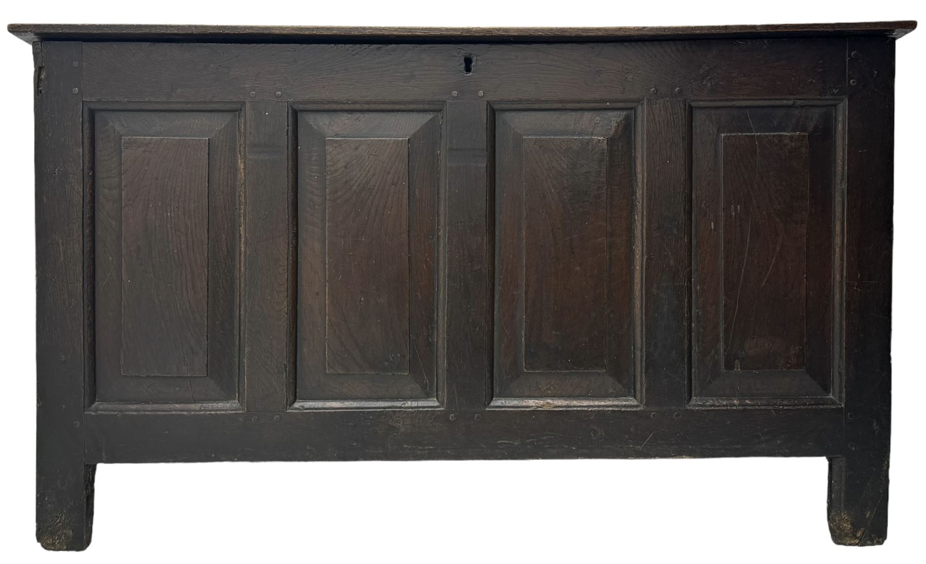 18th century oak coffer, rectangular plank lid over four panelled front and panelled sides, on stile supports 