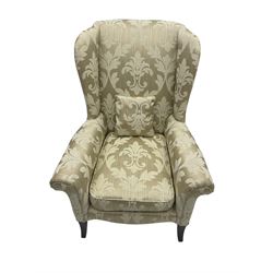 Parker Knoll - wingback armchair upholstered in champagne fabric with foliate pattern