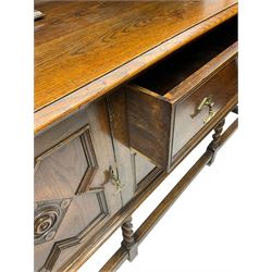 Jacobean Revival oak dresser, projecting moulded cornice over arcade carved frieze and panelled back, on spiral turned supports, moulded rectangular top over two cupboards and two drawers, on spiral turned supports united by moulded stretchers 