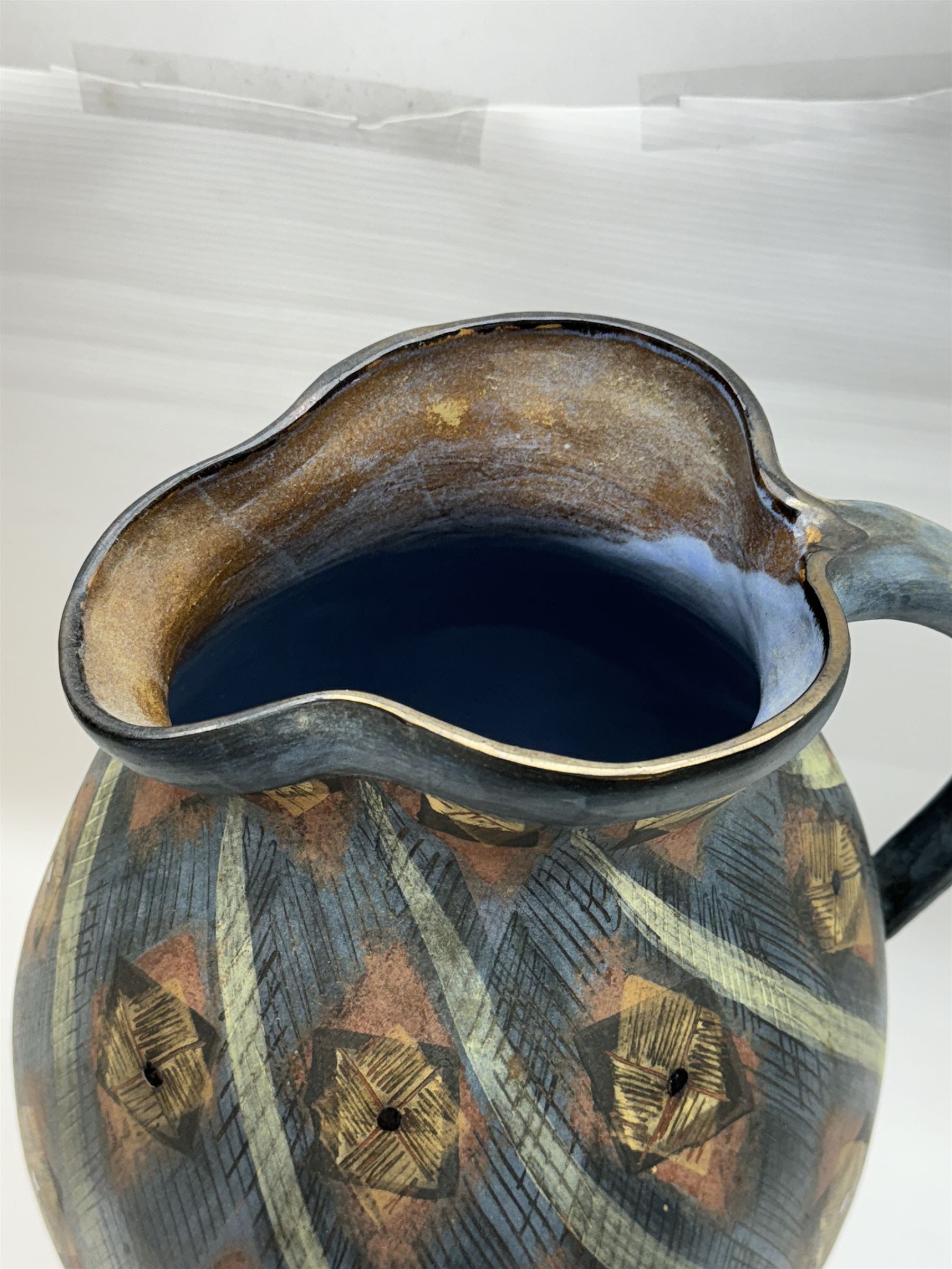 Jackie Walton; Studio pottery large jug decorated with geometric patters, together with another Jackie Walton vase, jug H52cm