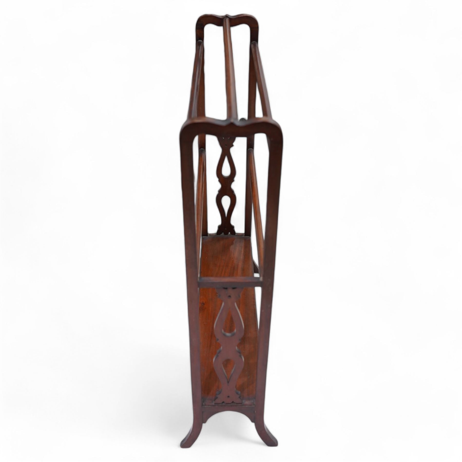 Edwardian mahogany towel rail, shaped and pierced splats and lower tier, on out splayed feet