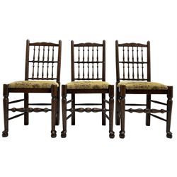 Set of six (4+2) 20th century oak spindle back dining chairs, with upholstered drop-on seat cushions, turned supports joined by turned stretchers