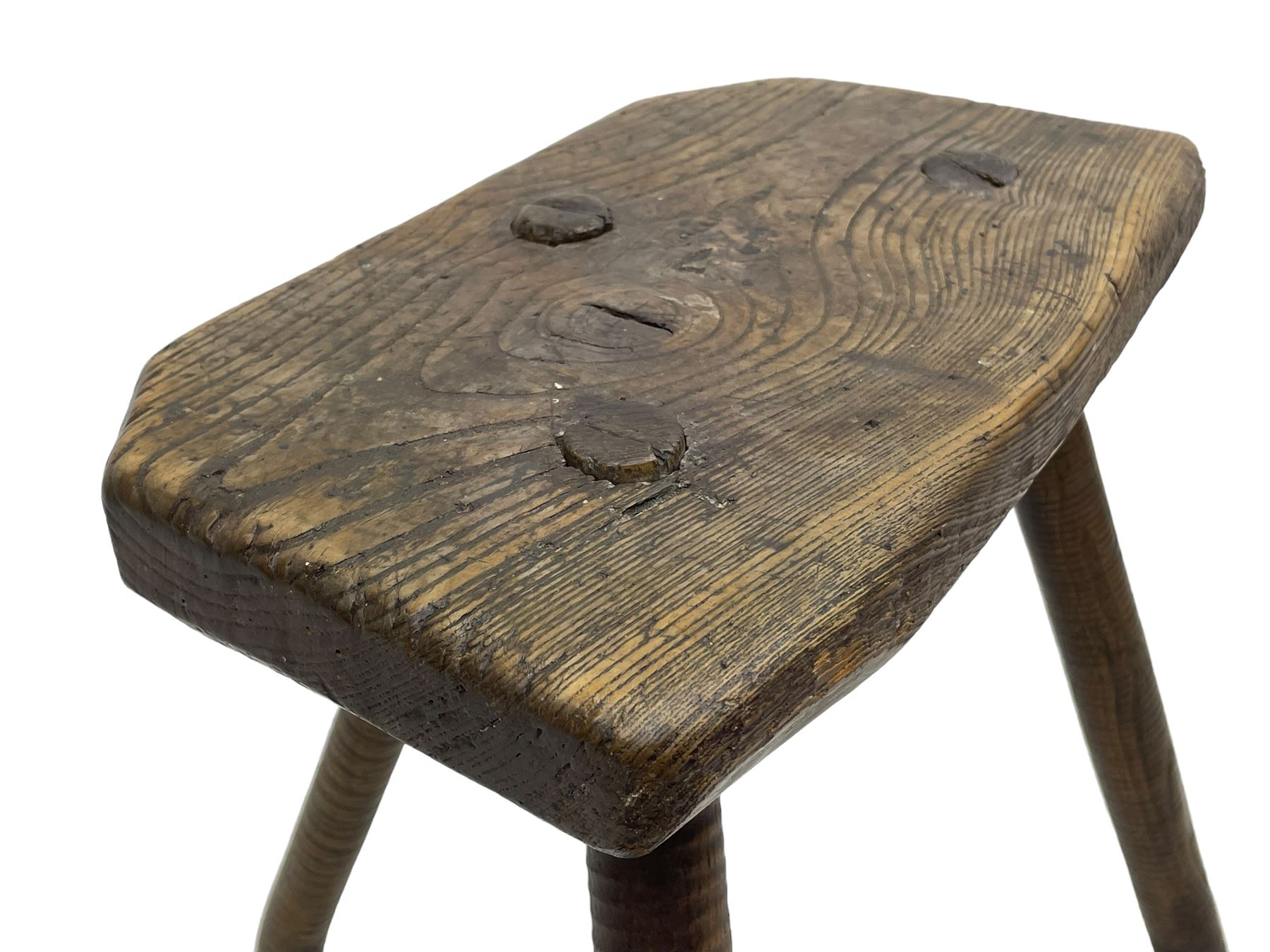 19th century elm cutler's stool, shaped seat on three rib turned supports