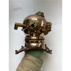 Copper novelty miniature diving helmet, together with underwater camera, helmet H20cm