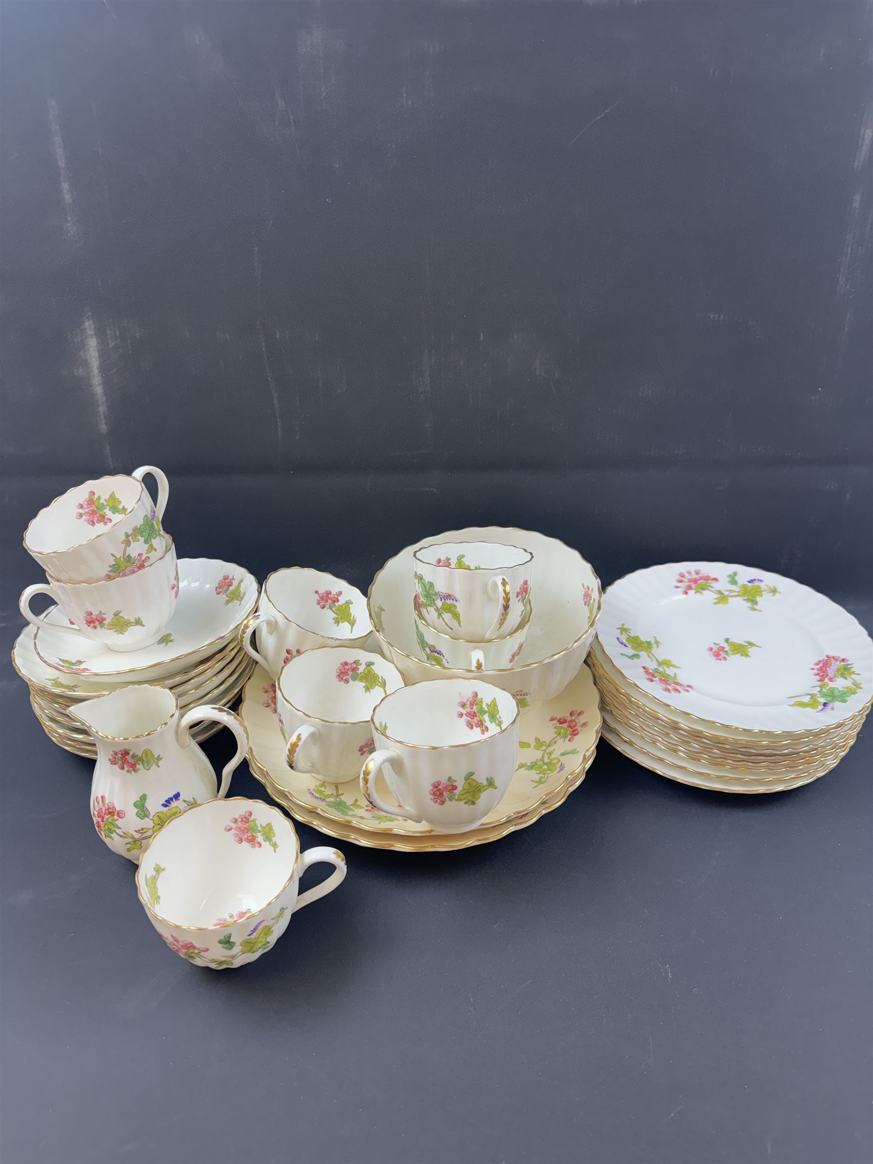 Coalport part tea service, decorated with floral sprigs, including eight cups and saucers, milk jug, eight dessert plates etc  