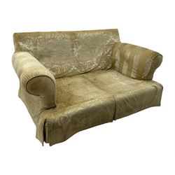 Contemporary two-seat sofa, upholstered in damask fabric with a pale gold floral pattern, rolled arms, loose back and seat cushions, on matching skirted base with concealed castors