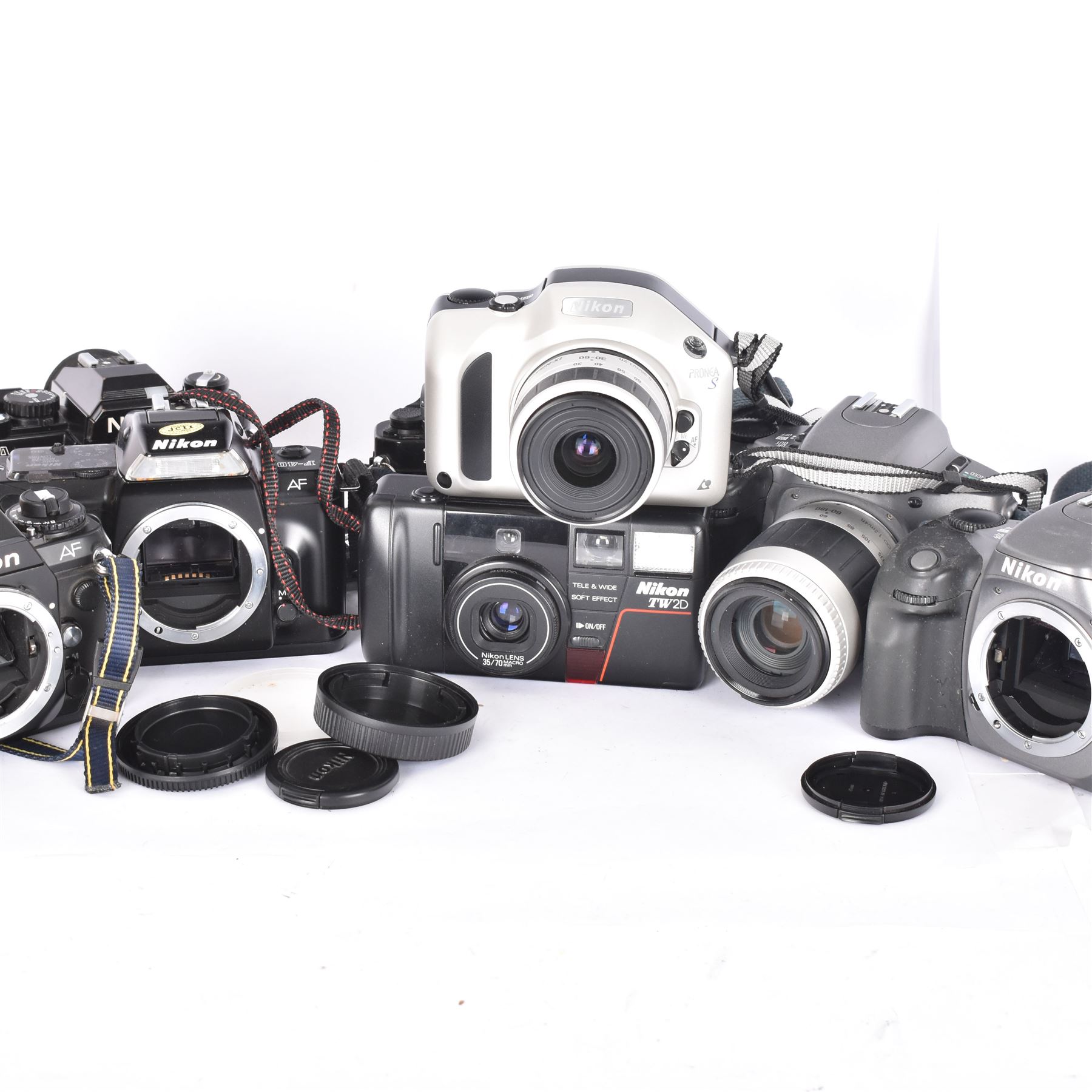 Collection of Nikon cameras, to include two Pronea 600i examples serial nos. 2040608 & 2043525, one with a IX-Nikkor 1:4.5-5.6 lens serial no. 2032529, Pronea S serial no. 2116530, with a IX-Nikkor 1:4-5.6 lens serial no. 2113968, a TW2D serial no. 6069039, F-401, F-501 and two FA camera bodies 