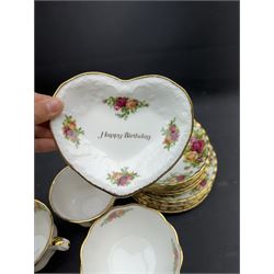 Royal Albert Old Country Roses tea service for six, comprising teapot, milk jug, open sucrier, cups and saucers, dessert plates, two trinket dishes covered jar and clock