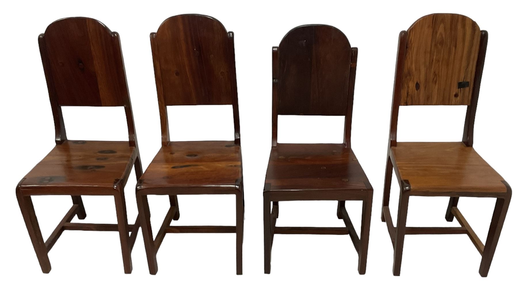 Mid-to-late 20th century teak dining table, rectangular top with canted corners, on square tapering supports with spade feet (214cm x 119cm, H76cm); and a set of eight Burmese reclaimed teak dining chairs, high arched back over panelled seat