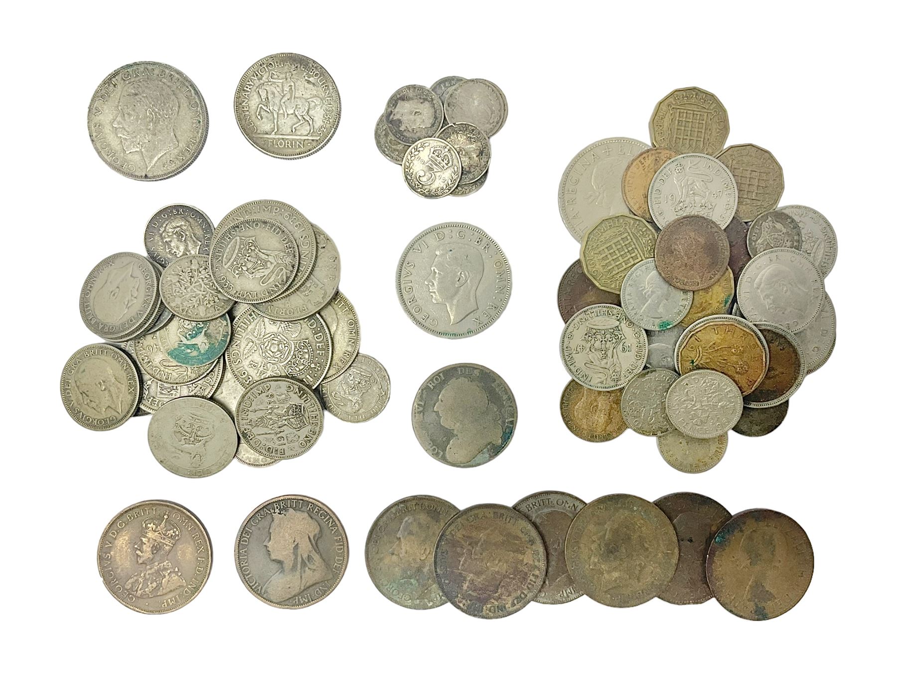 Approximately 135 grams of Great British pre 1947 silver coins, small number of pre 1920 silver threepence pieces, Australia 1935 Centenary florin token, pre-decimal pennies and other coinage