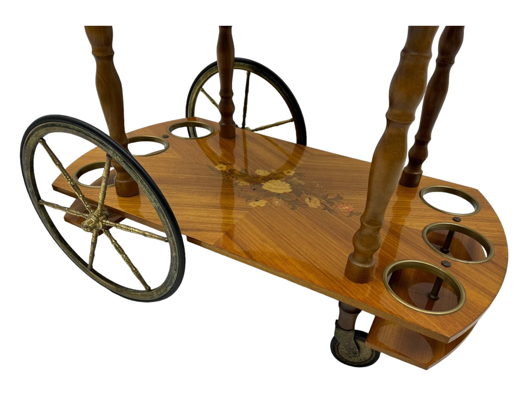 Mid 20th century walnut and satinwood drinks trolley, drop-leaf top with Italian marquetry, turned supports connecting lower shelf fitted with bottle holders and additional storage, on large brass-spoked wheels