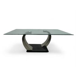 Contemporary coffee table, rectangular clear glass top over brushed stainless steel curved...