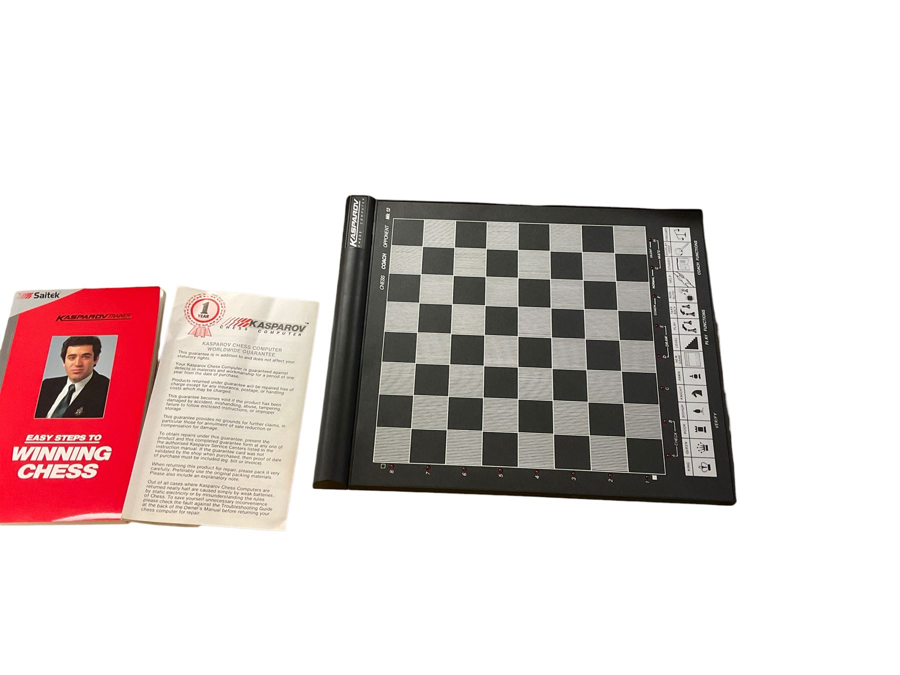 Collection of wooden chess pieces, together with two boards and a MK12 trainer Kasparov training programme 