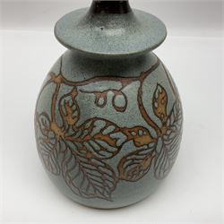 John Egerton (c1945-): studio pottery stoneware, comprising wine cooler decorated with herons on a mottled ground, covered storage jar with foliage decoration and a lamp base decorated with grape vines, wine cooler H23cm