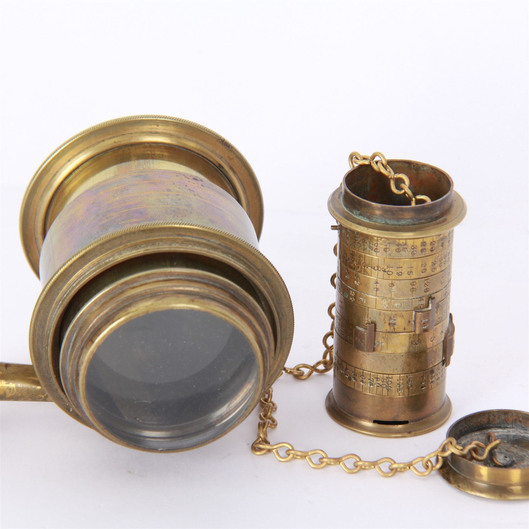 Late 19th century Watkins Exposure Meter, in cylindrical brass case, inscribed Sole Makers R. Field & Co, Birmingham, together with a 19th century brass plate camera lens