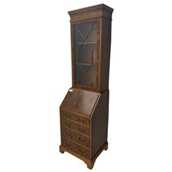 Mid-to-late 20th century yew wood bureau bookcase, raised bookcase enclosed by glazed door, the fall front revealing fitted interior, four graduating cock-beaded drawers below, on bracket feet