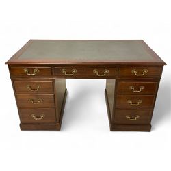 Late 19th century mahogany twin pedestal desk, moulded rectangular top with inset leather, fitted with nine drawers, on plinth base