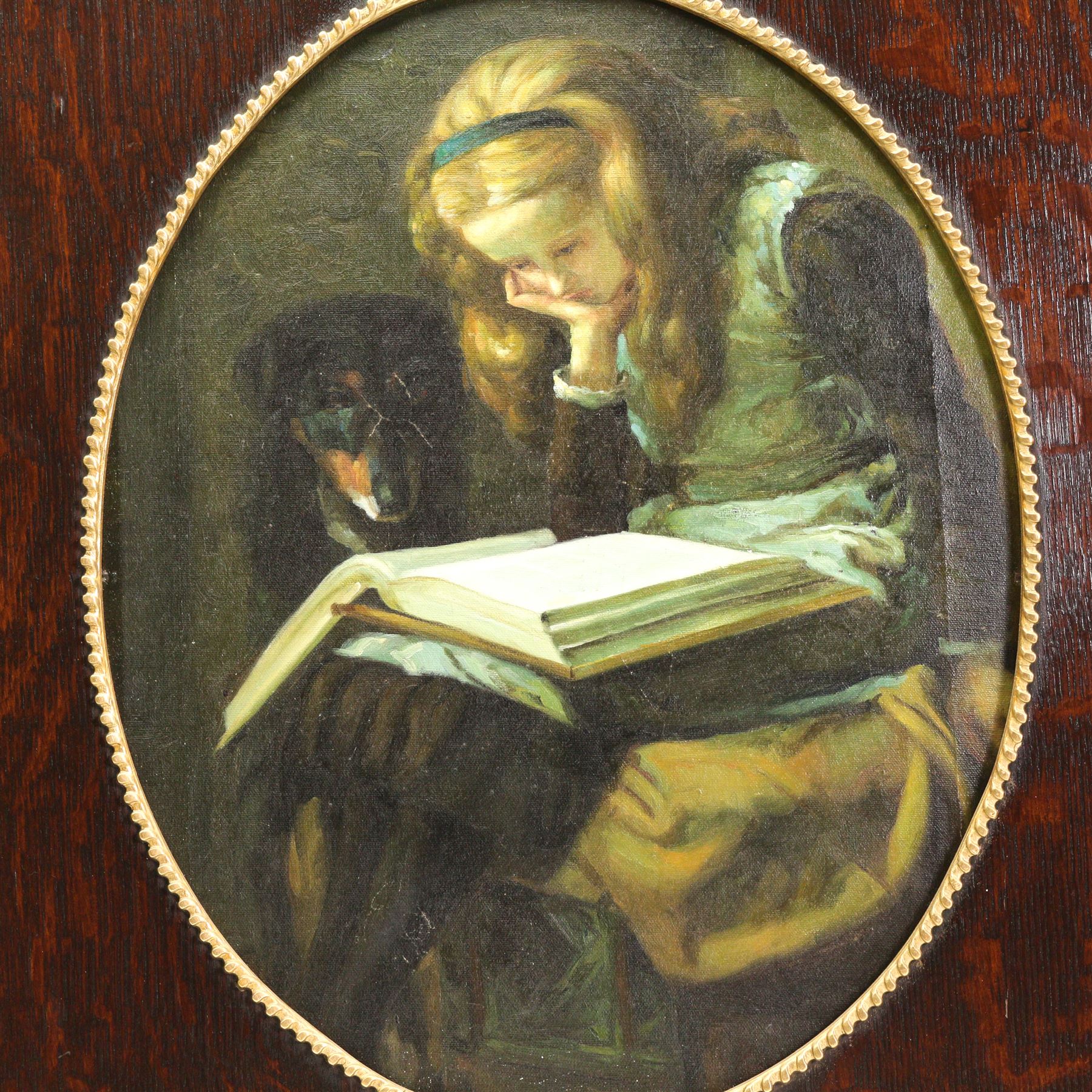 After Briton Riviere (British 1840-1920): Girl Reading with Dog, oil on canvas in ornate oval frame aperture 49cm x 39cm overall 72cm x 61cm 