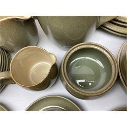 Denby tea and dinner wares, including bowls, jugs, tureens, side plates, dinner plates, serving dishes, cups and saucers, coffee pot, etc, all decorated with a green and brown mottled glaze, with printed marks beneath, in two boxes 