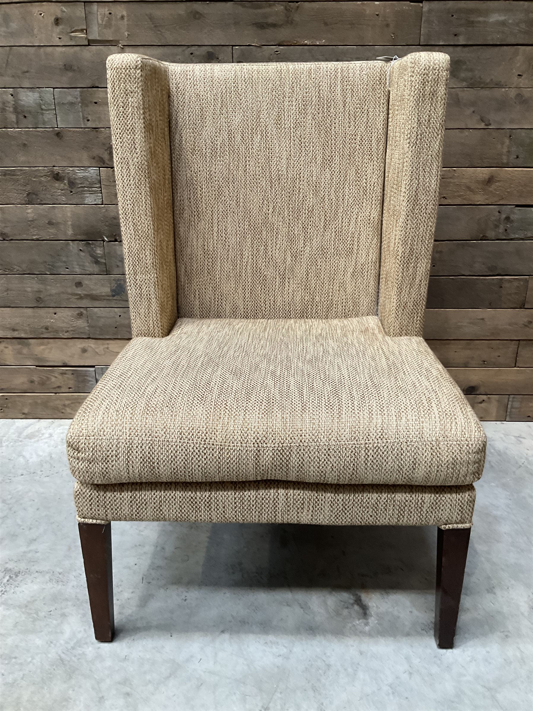 High wing back armchair, upholstered in oatmeal fabric