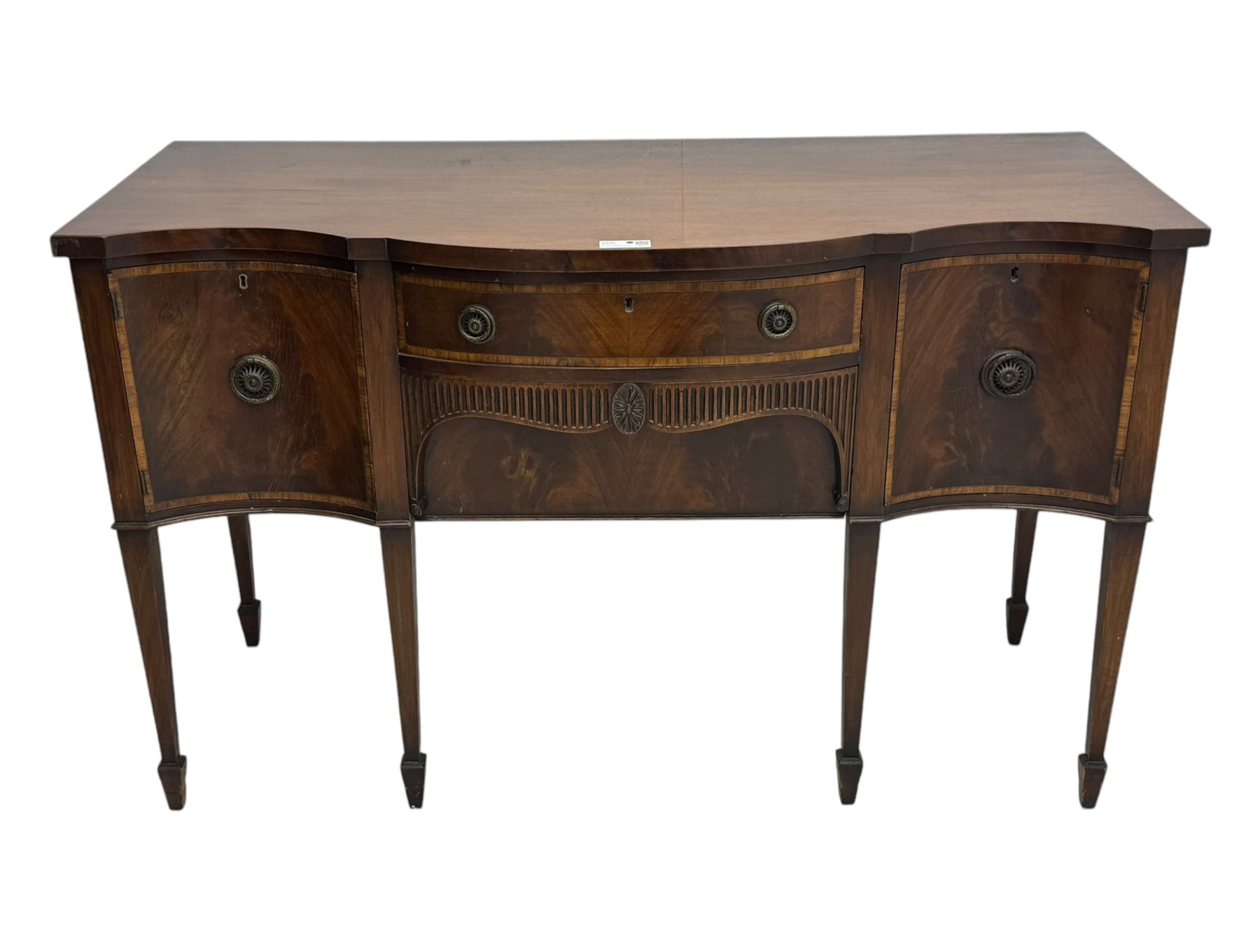 Early 19th century serpentine sideboard, fitted with two cupboards and two drawers, on square tapering supports with spade feet