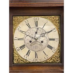 William Watson of  Blackburn (Lancs)  - late 18th century 8-day oak and mahogany cross banded longcase clock, with a flat top and open fretwork above, deep cornice with dogtooth moulding and frieze beneath, square hood door flanked by reeded pilasters with brass capitals, trunk with  reeded quarter columns, long trunk door with concave corners on a plinth with canted corners on bracket feet, brass dial with cast brass spandrels, broad silvered chapter ring with Roman numerals and five-minute Arabic's, a profusely engraved and silvered dial centre with seconds dial, matching steel hands and calendar aperture, hourly rack striking movement with a recoil anchor escapement. With weights, pendulum and key. 
William Watson of Northgate, Blackburn, is recorded as working c1770-1814 . As with this clock he frequently signed some of his clocks without a placename.