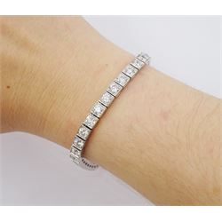 18ct white gold round brilliant cut diamond bracelet, Edinburgh hallmark, total diamond weight 7.66 carat, with document