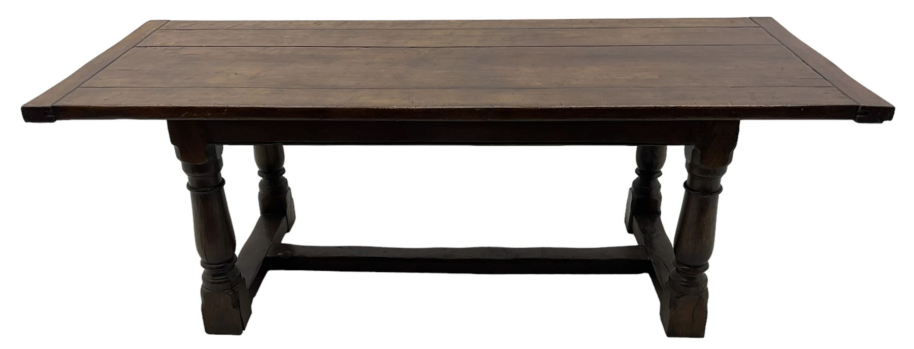 20th century Jacobean design oak refectory dining table, rectangular plank top with cleated ends, on turned supports united by H-stretchers 