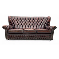 Georgian design buttoned oxblood leather three-seat sofa, deep-buttoned backrest, scrolled...