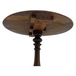 Mid-19th century mahogany tripod table, moulded circular top on vasiform pedestal with three carved out-splayed supports 