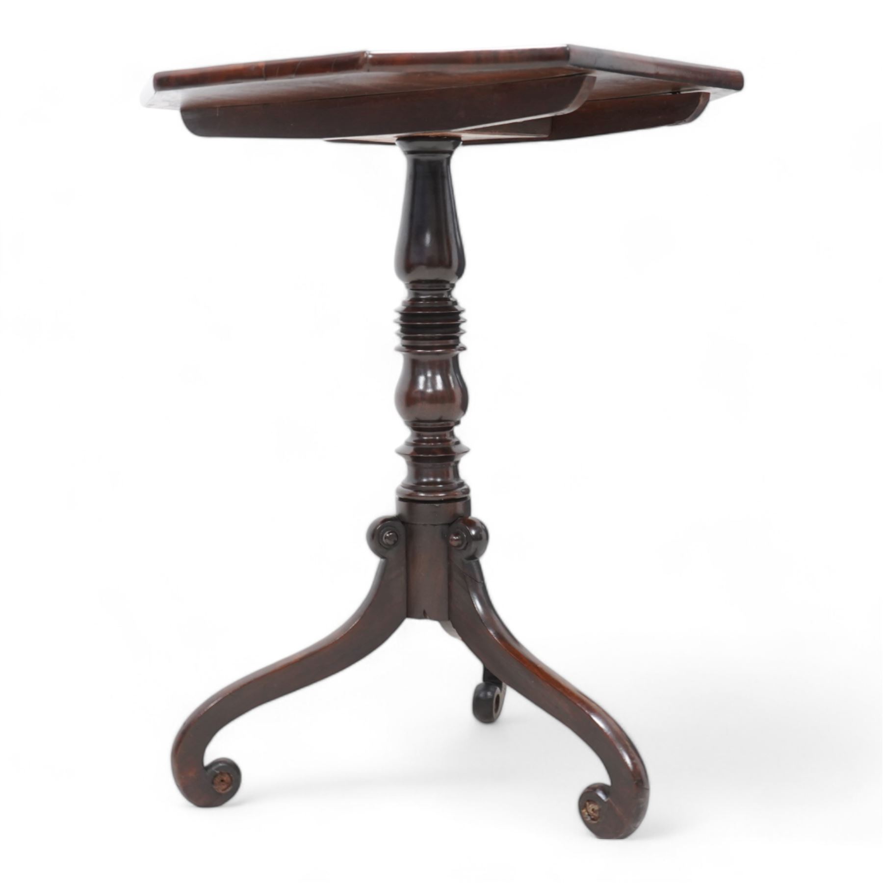 Regency mahogany tripod table, canted square tilt-top on turned column, three out splayed supports with scrolled terminals 