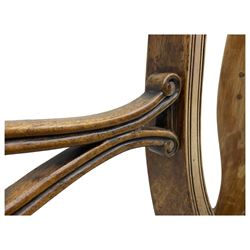 Set of six early 19th century mahogany dining chairs, bar cresting rail over pierced and shell carved middle rail, reed moulded uprights, upholstered seats on reed moulded sabre supports 