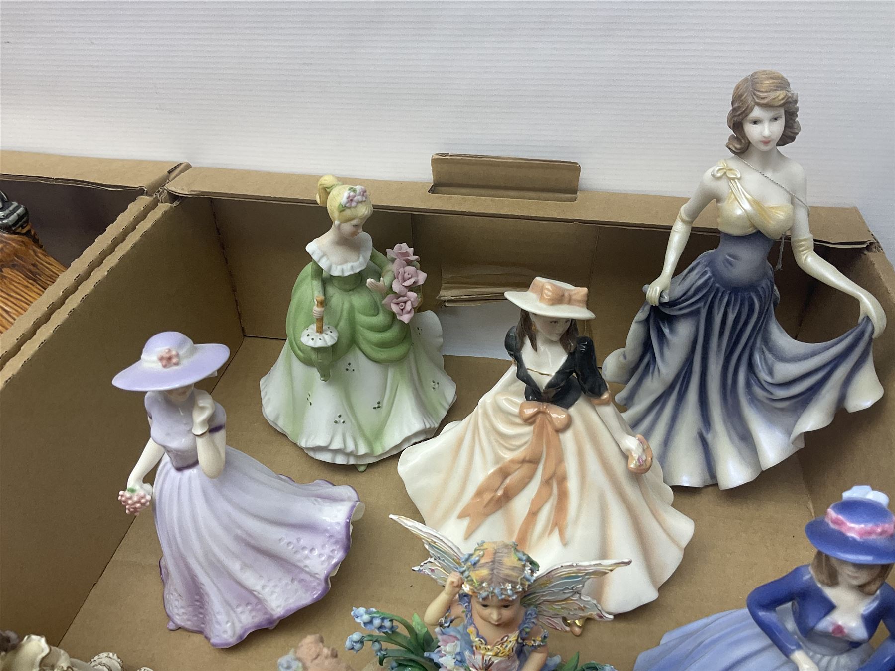 Five Royal Worcester figures including Emma and Felicity, together with similar figures, glass animals, paperweights, Murano glass clown, and a collection of animal figures, etc, in three boxes