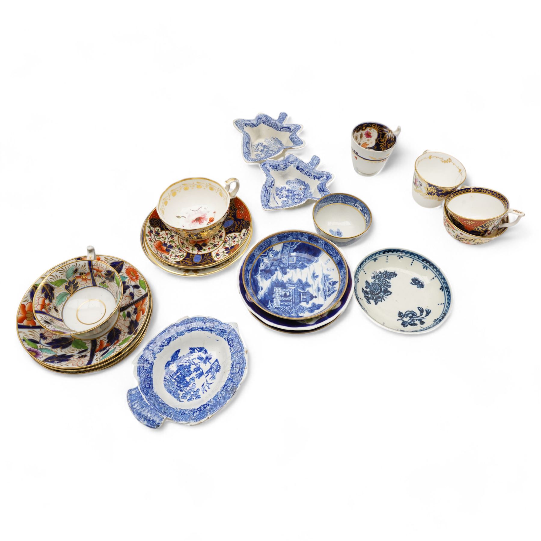 Pair of early 19th century blue and white leaf-shaped pickle dishes, and various 19th century English tea cups and saucers 