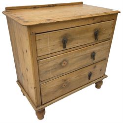 Victorian stripped pine chest, fitted with three drawers and raised on turned feet