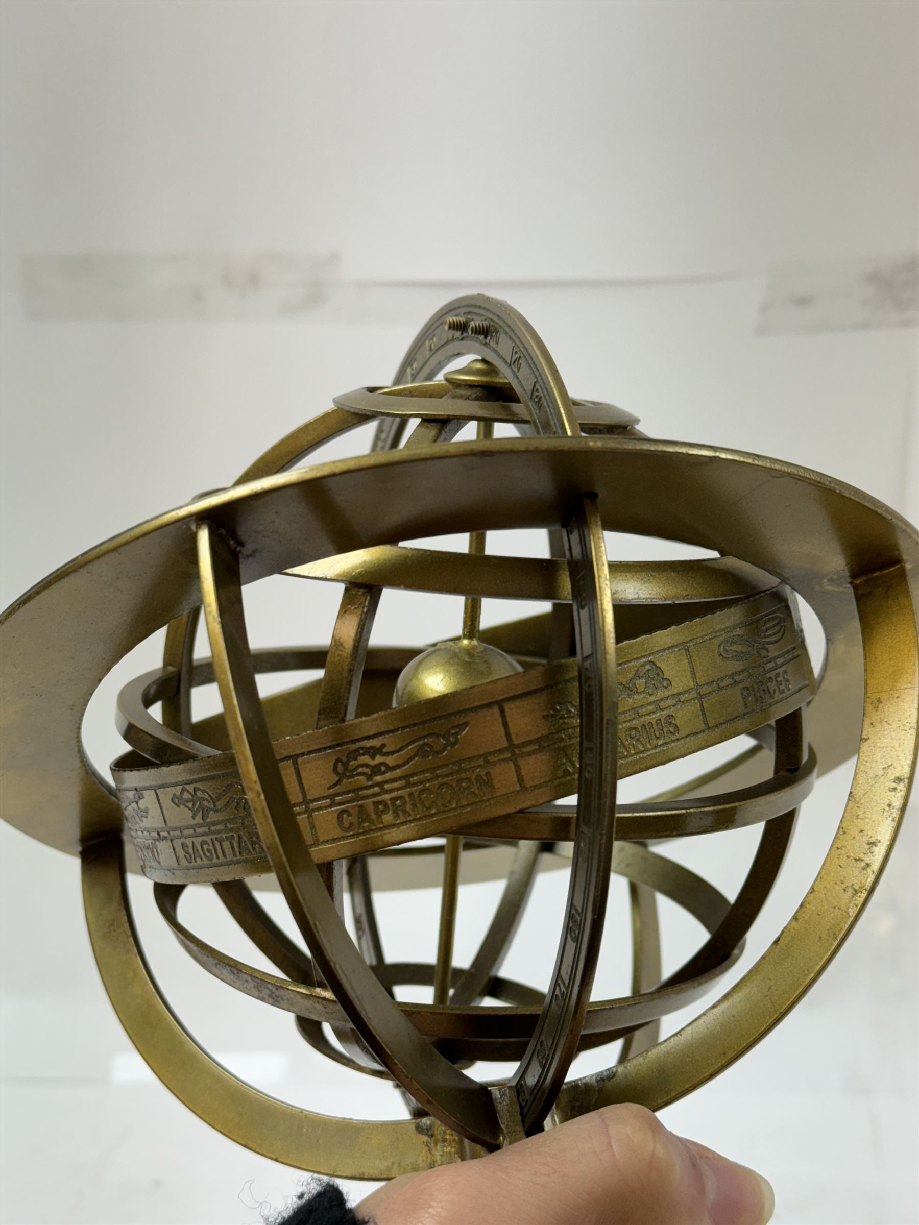 Brass table top globe armillary sphere, H26cm