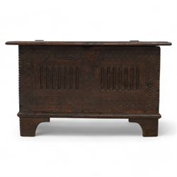 18th century and later plank kist, rectangular form, moulded hinged lid over guilloche and fluted front with chip carved edge, on bracket feet 