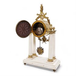 French - White marble and gilt 8-day mantel clock c1900,  with a rectangular plinth raised on four feet, gilt drum movement supported on four tapered pillars with gilt torus base and pineapple finials, convex enamel dial with floral swags and Arabic numerals, minute markers and gilt Louis XV hands, twin train Parisian countwheel striking movement, striking the hours and half-hours on a bell. With a sunburst pendulum.